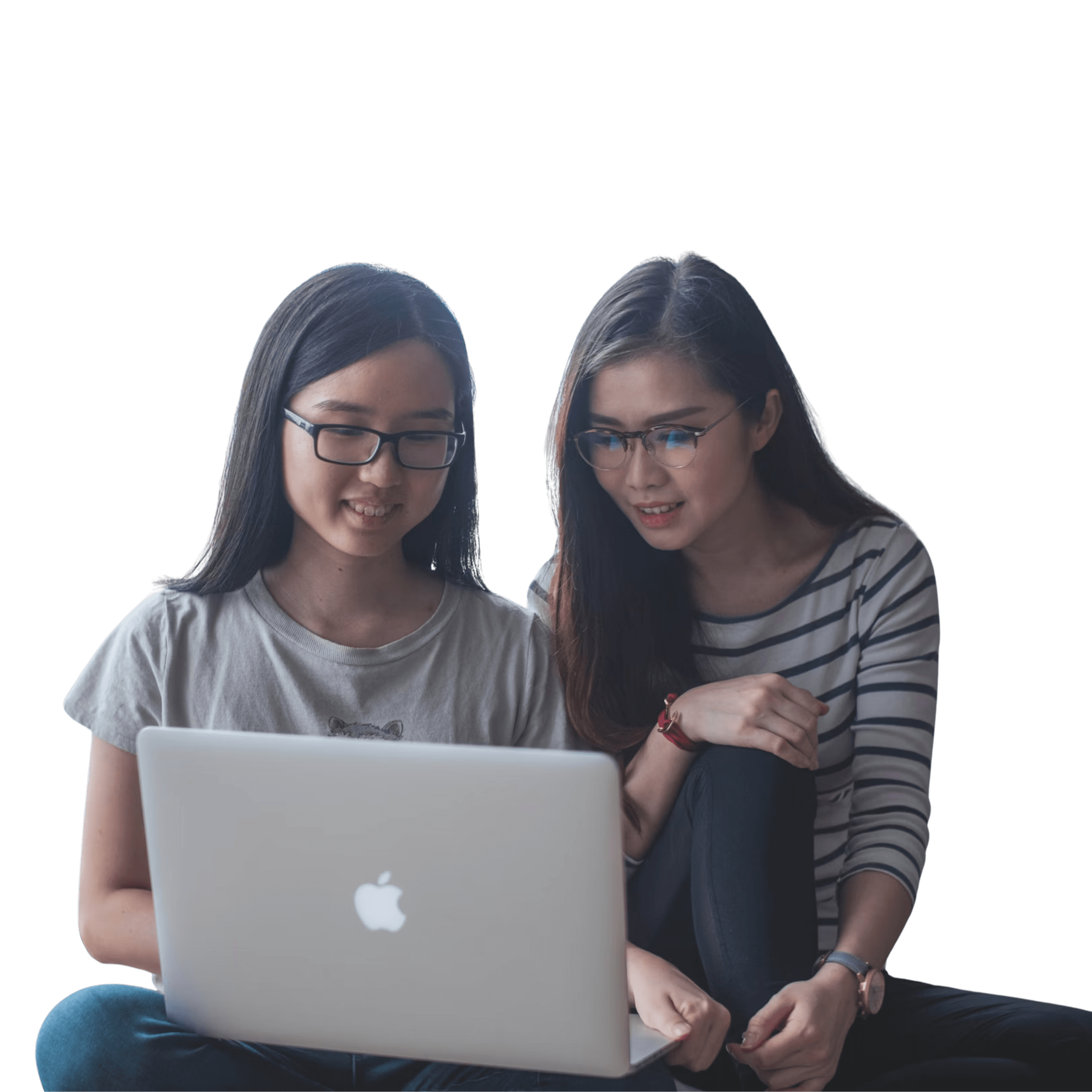 Duas mulheres olhando juntas para um notebook